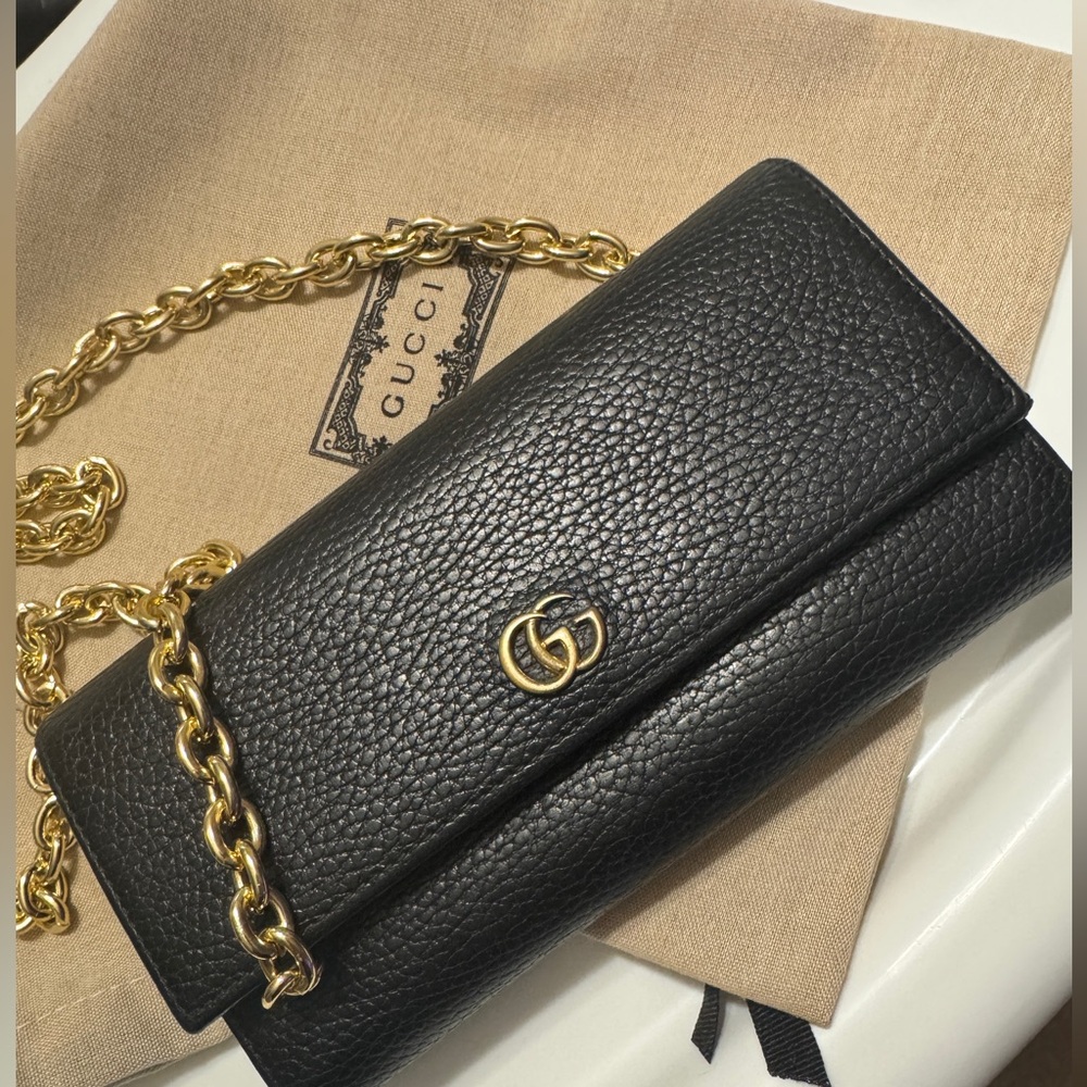 Gucci black Double small G. WOC
Amazing condition.